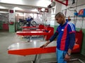 an indian service worker touching platform at hero workshop in india January 2020