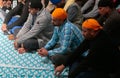 Indian sikh men seen inside their temple during Baisakhi celebration in Mallorca