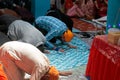 Indian sikh pray inside their temple during Baisakhi celebration in Mallorca