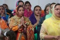 Indian sikh pray women inside their temple during Baisakhi celebration in Mallorca