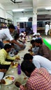 Indian Sitting dinner in a group