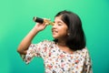 Indian small girl using telescope and studying space science Royalty Free Stock Photo