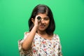 Indian small girl using telescope and studying space science Royalty Free Stock Photo