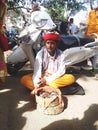 This is Indian small snake man .he is Raju .he is very poor man.