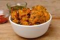 Indian snack pakora with tomato sauce or chutney Royalty Free Stock Photo