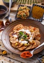 Indian snack papri chaat served with yoghurt with seasoning Royalty Free Stock Photo