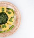 Indian Snacks Dhokla with green chutney