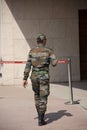 Indian soldier people walking check and security around of india Gate originally called the All India War Memorial