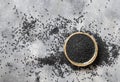 Indian spice Black cumin nigella sativa or kalonji seeds in bowl top view