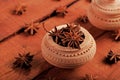 Organic Indian Spice Star Anise in a Handicraft Pottery Bowl Royalty Free Stock Photo