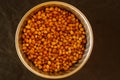 Shot of a bowl of coriander seeds.