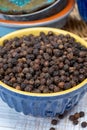 Indian spices collection, dried black peppercorns, kitchen spices Royalty Free Stock Photo