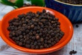 Indian spices collection, dried black peppercorns, kitchen spices Royalty Free Stock Photo