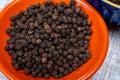 Indian spices collection, dried black peppercorns, kitchen spices Royalty Free Stock Photo