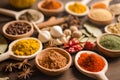 Indian spices and dried herbs on wooden table Royalty Free Stock Photo