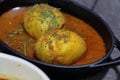 An Indian spread of spicy Egg curry or Egg Masala in a bowl