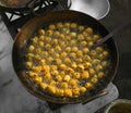 Indian Street Food Group of Frying Pakora or Bhajiya in oil