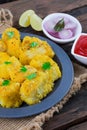 Indian Street Food Khaman Dhokla on Wooden Background Royalty Free Stock Photo