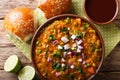 Indian street food Pav bhaji vegetables close-up in a bowl. horizontal top view Royalty Free Stock Photo