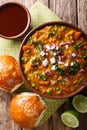 Indian street food Pav bhaji vegetables close-up in a bowl. Vert Royalty Free Stock Photo