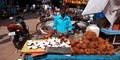 indian street fresh coconut seller standing at carriage shop in india oct 2019