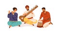 Indian street musicians playing traditional folk music on national instruments. Men in ethnic clothes performing on
