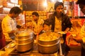 Indian street vendor make fast food in evening