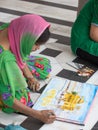 Indian students draws from nature the image of the Golden Temple Royalty Free Stock Photo