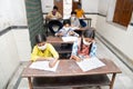 Indian Students Studying In Classroom Wearing Mask And Social Distancing, school reopen during covid19