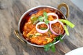 INDIAN STYLE COTTAGE CHEESE VEGETARIAN CURRY DISH. Kadai Paneer - Traditional Indian or Punjabi food. Garnished with onion and chi