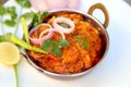 INDIAN STYLE COTTAGE CHEESE VEGETARIAN CURRY DISH. Kadai Paneer - Traditional Indian or Punjabi food. Garnished with onion and Royalty Free Stock Photo