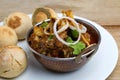 Indian style meat dish or mutton curry with bati