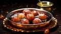 Sweet Gulab Jamun in Metal Bowl