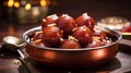 Sweet Gulab Jamun in Metal Bowl