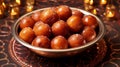 Sweet Gulab Jamun in Metal Bowl