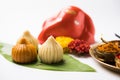 Indian sweet food called modak prepared specifically in ganesh festival or ganesh chaturthi Royalty Free Stock Photo