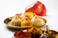 Indian sweet food called modak prepared specifically in ganesh festival or ganesh chaturthi Royalty Free Stock Photo