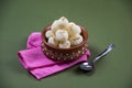 Indian Sweet - Rasgulla, Famous Bengali sweet in clay bowl with napkin