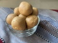 Indian sweets Besan ladoo or laddu are delicious sweet balls made with gram flour, sugar, ghee cardamoms Royalty Free Stock Photo