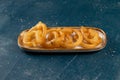 indian sweets deep fired jalebi, jilipi, jilabi served in a dish isolated on background top view