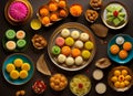 Indian sweets of peda, kaju katli, burfi, laddu in decorative plate