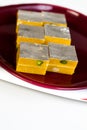 Indian sweets kaaju kalti garnished with silver foil Royalty Free Stock Photo