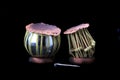 Indian tabla drums on a black background