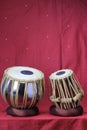 Indian tabla drums on a red background Royalty Free Stock Photo