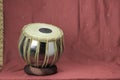 Indian tabla drums on a red background