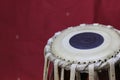 Indian tabla drums on a red background