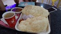 Indian tasty chole bhatore with green cold drinks