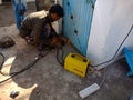 an indian technician making door at construction site in India January 2020 Royalty Free Stock Photo