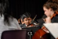 Indian teen boy play violin Royalty Free Stock Photo