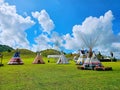 Indian Tent, Teepee Tent, Camping on the field over the blue sky. Royalty Free Stock Photo